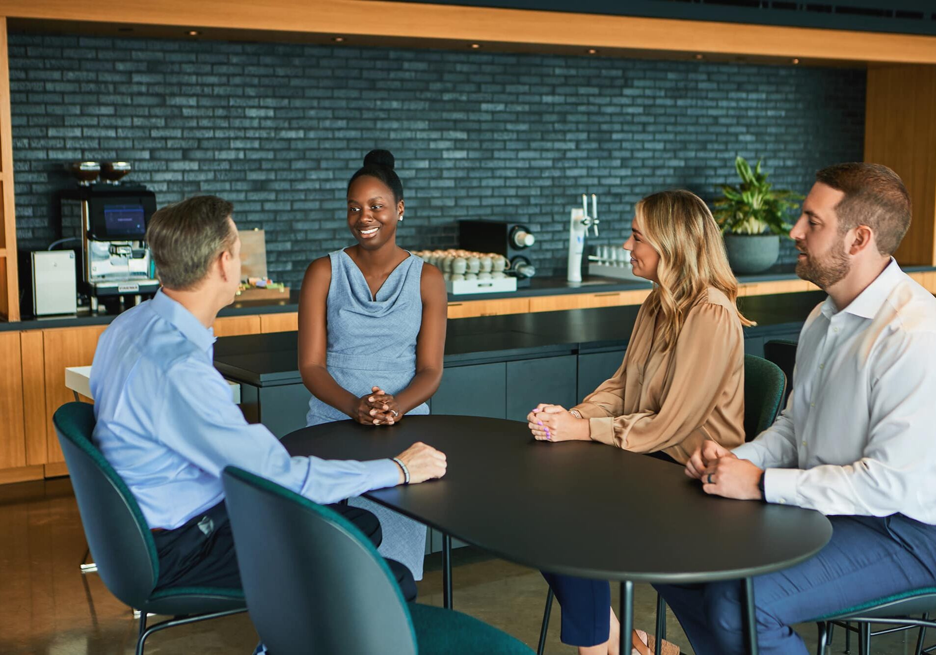 Glassman Wealth Employee talking to client